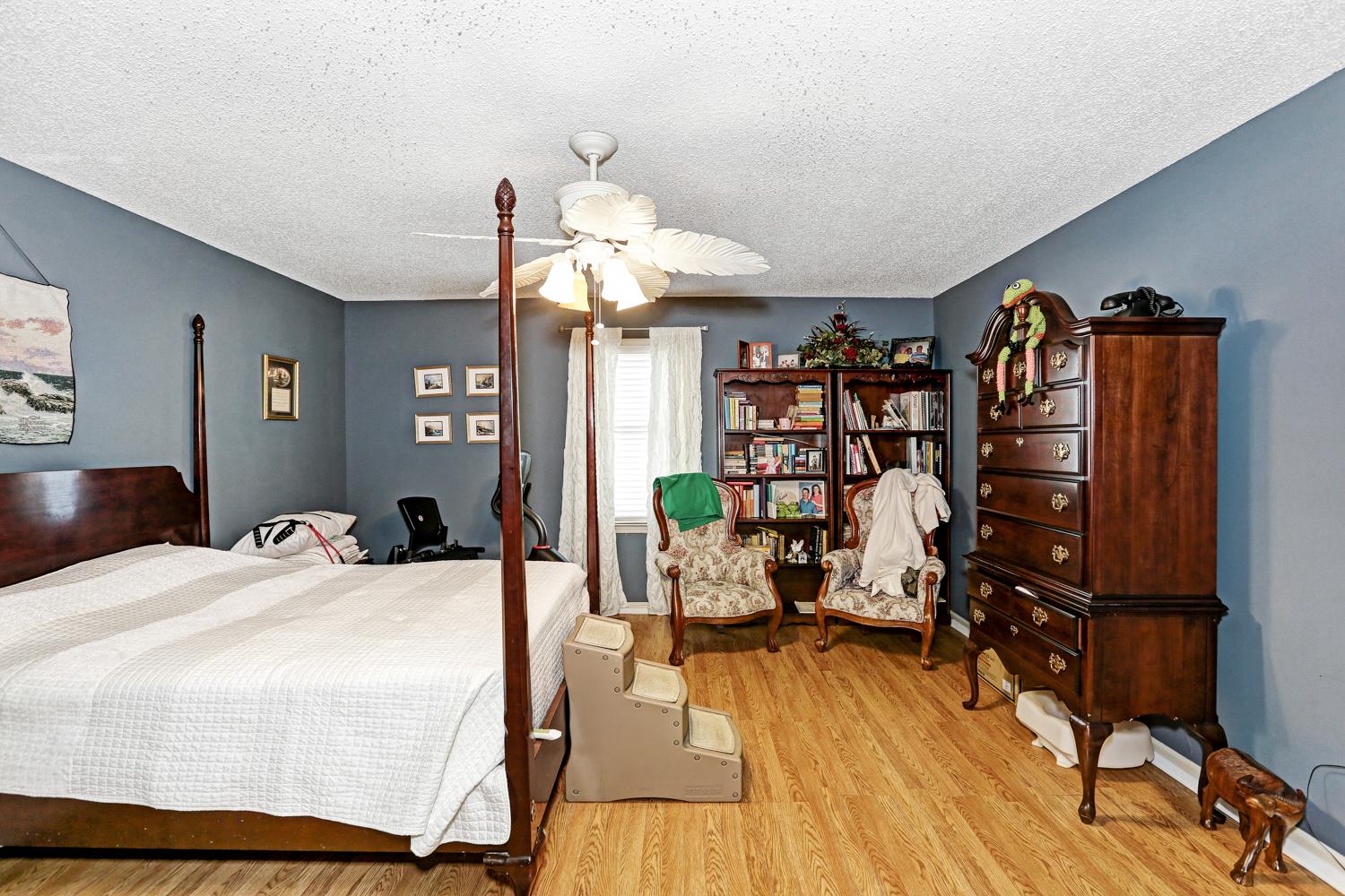 2345 Crescentview Road Pulaski, TN 38478 - Photo 11 of 23 a bedroom with a bed furniture and a flat tv screen