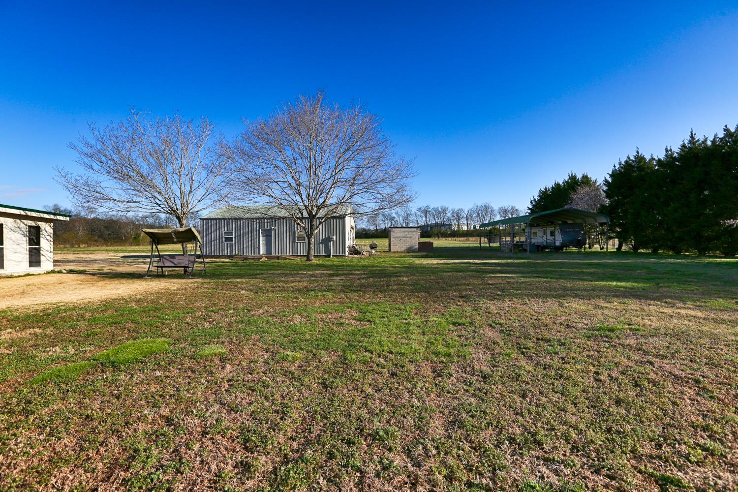 2345 Crescentview Road Pulaski, TN 38478 - Photo 19 of 23 a view of a lake with a building in the background