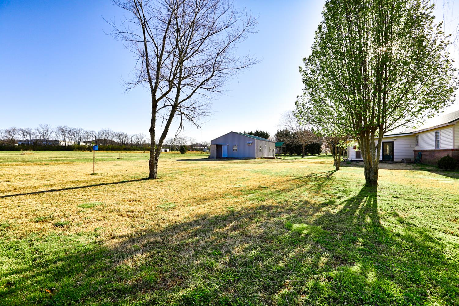2345 Crescentview Road Pulaski, TN 38478 - Photo 20 of 23 a view of a swimming pool with an outdoor space and seating area