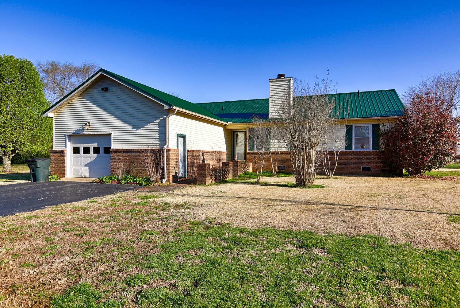 2345 Crescentview Road Pulaski, TN 38478 - Photo 23 of 23 a front view of a house with a yard and garage