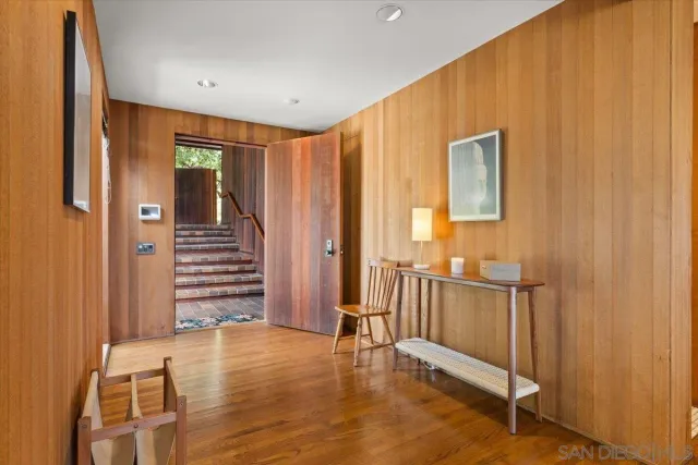 a view of entryway with wooden floor