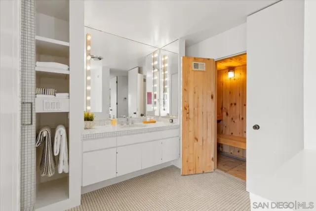 a room with furniture and a potted plant