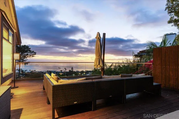 a outdoor space with patio furniture and potted plants