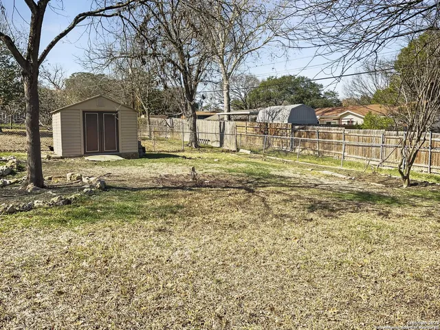 a view of a livingroom with wooden floor