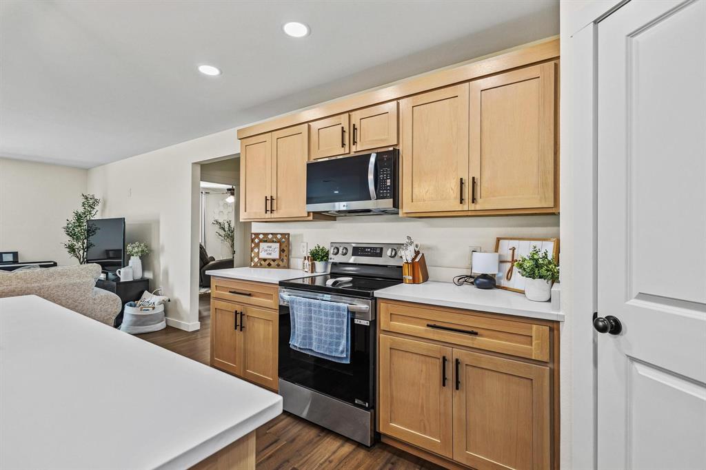 997 Private Road Brookston, TX 24977 - Photo 12 of 28 a kitchen with a sink stove and microwave