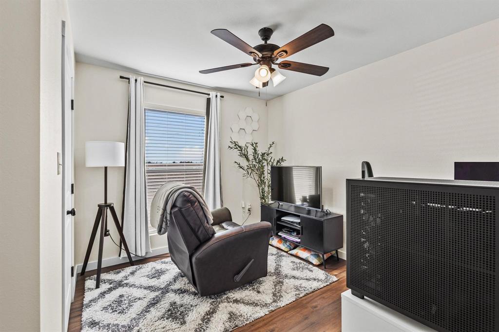 997 Private Road Brookston, TX 24977 - Photo 18 of 28 a living room with furniture and a fireplace