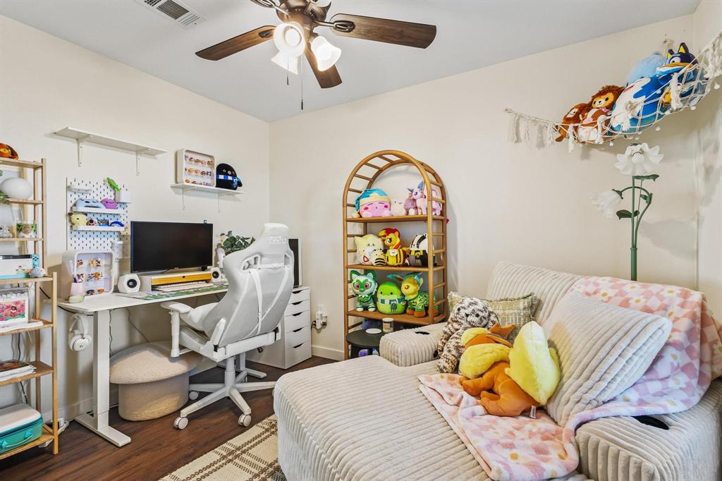 997 Private Road Brookston, TX 24977 - Photo 22 of 28 a bedroom with a bed and a flat screen tv