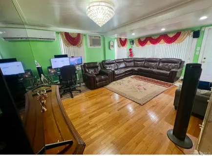 a bed room with a bed mirror and a desk