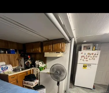 a view of a room with washer and dryer