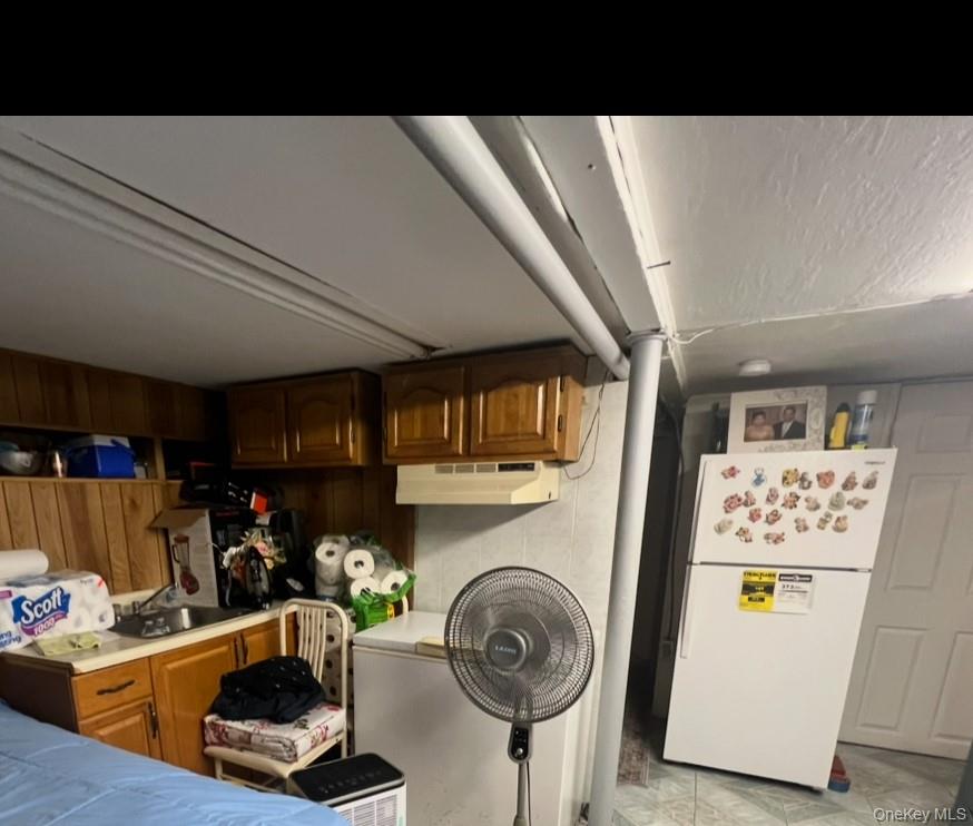 93-53 207th Street Queens, NY 11428 - Photo 27 of 36 a view of a room with washer and dryer