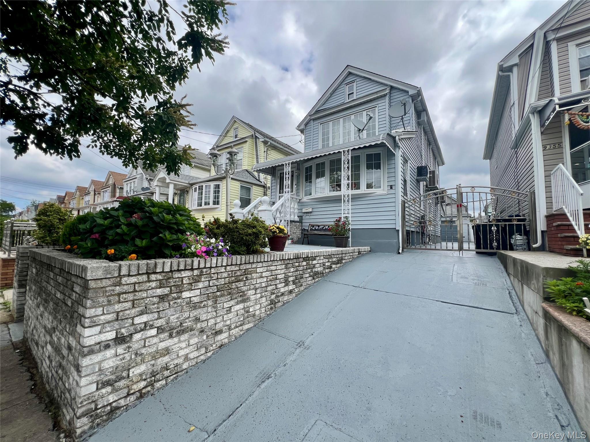 93-53 207th Street Queens, NY 11428 - Photo 35 of 36 a view of outdoor space and yard