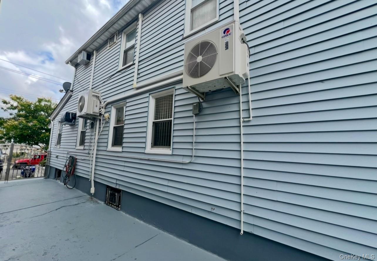 93-53 207th Street Queens, NY 11428 - Photo 6 of 36 a view of a back side of house