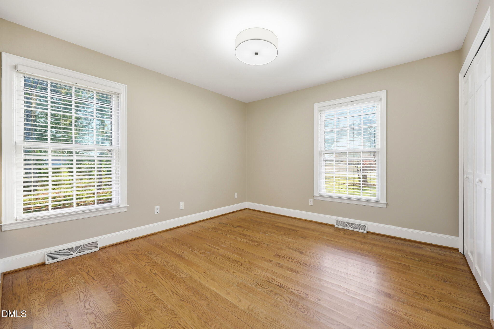1130 Prospect Church Road Dunn, NC 28334 - Photo 31 of 47 a view of an empty room with wooden floor and a window