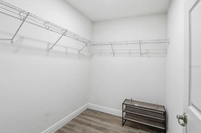 a view of a room with racks on the wall