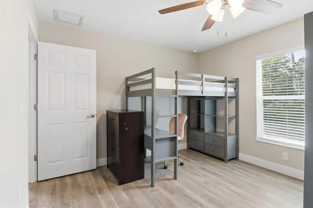 a view of a livingroom with furniture and windows