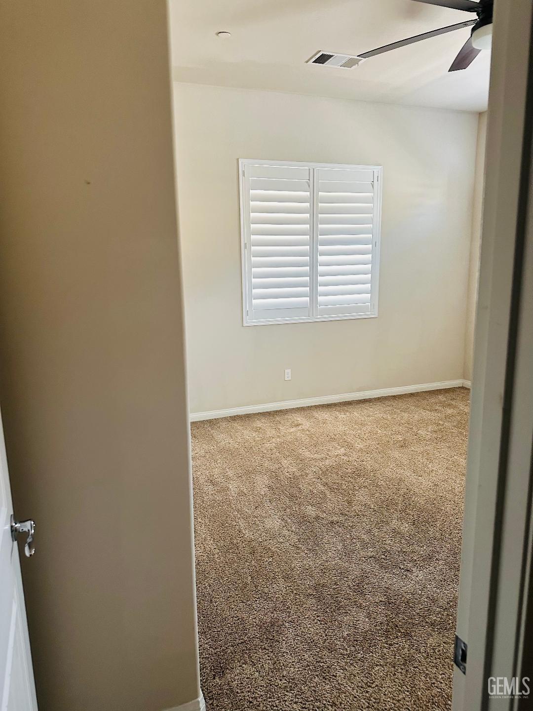 Undisclosed Address Bakersfield, CA 93314 - Photo 19 of 32 an empty room with a window