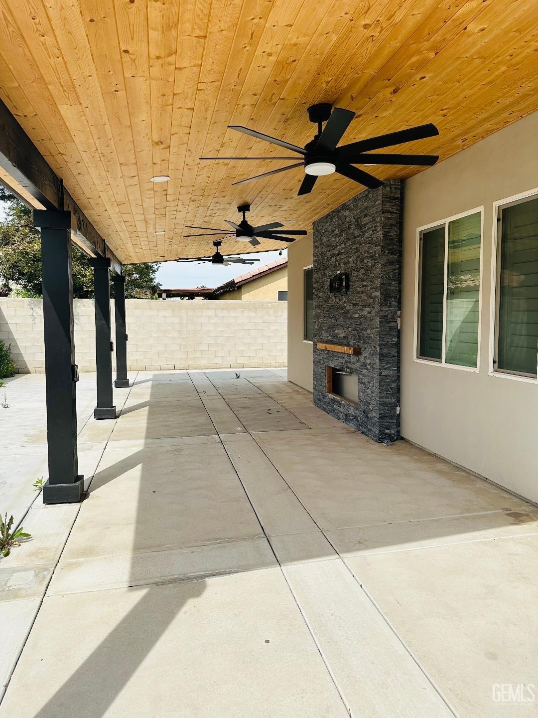 Undisclosed Address Bakersfield, CA 93314 - Photo 9 of 32 a view of a pathway with a building in the background