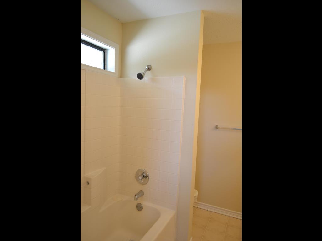 807 Welsh Avenue College Station, TX 77840 - Photo 7 of 11 a bathroom with a shower and a sink