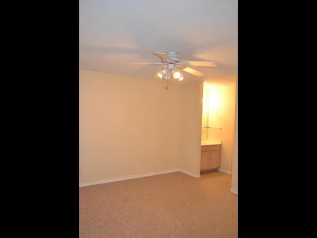 a view of a room with a bathroom