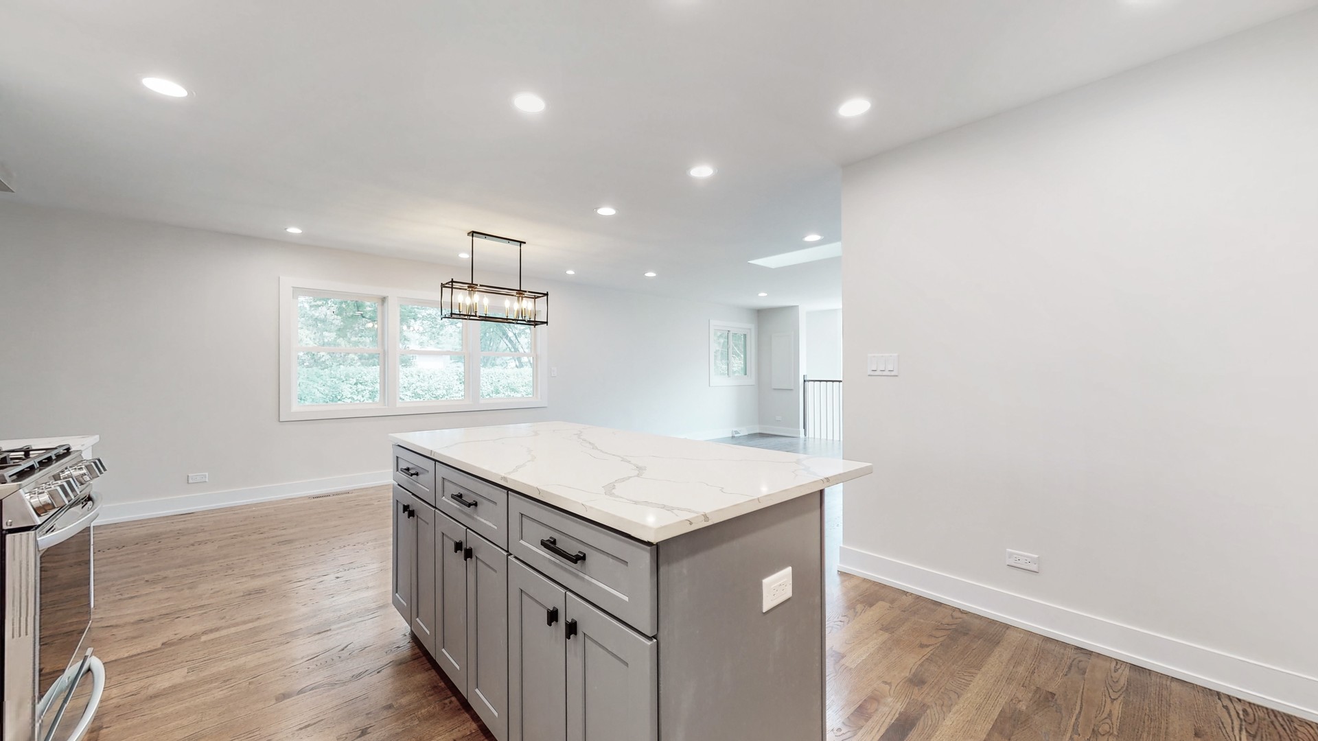 1617 Birch Road Northbrook, IL 60062 - Photo 14 of 32 a kitchen that has a sink and a stove in it