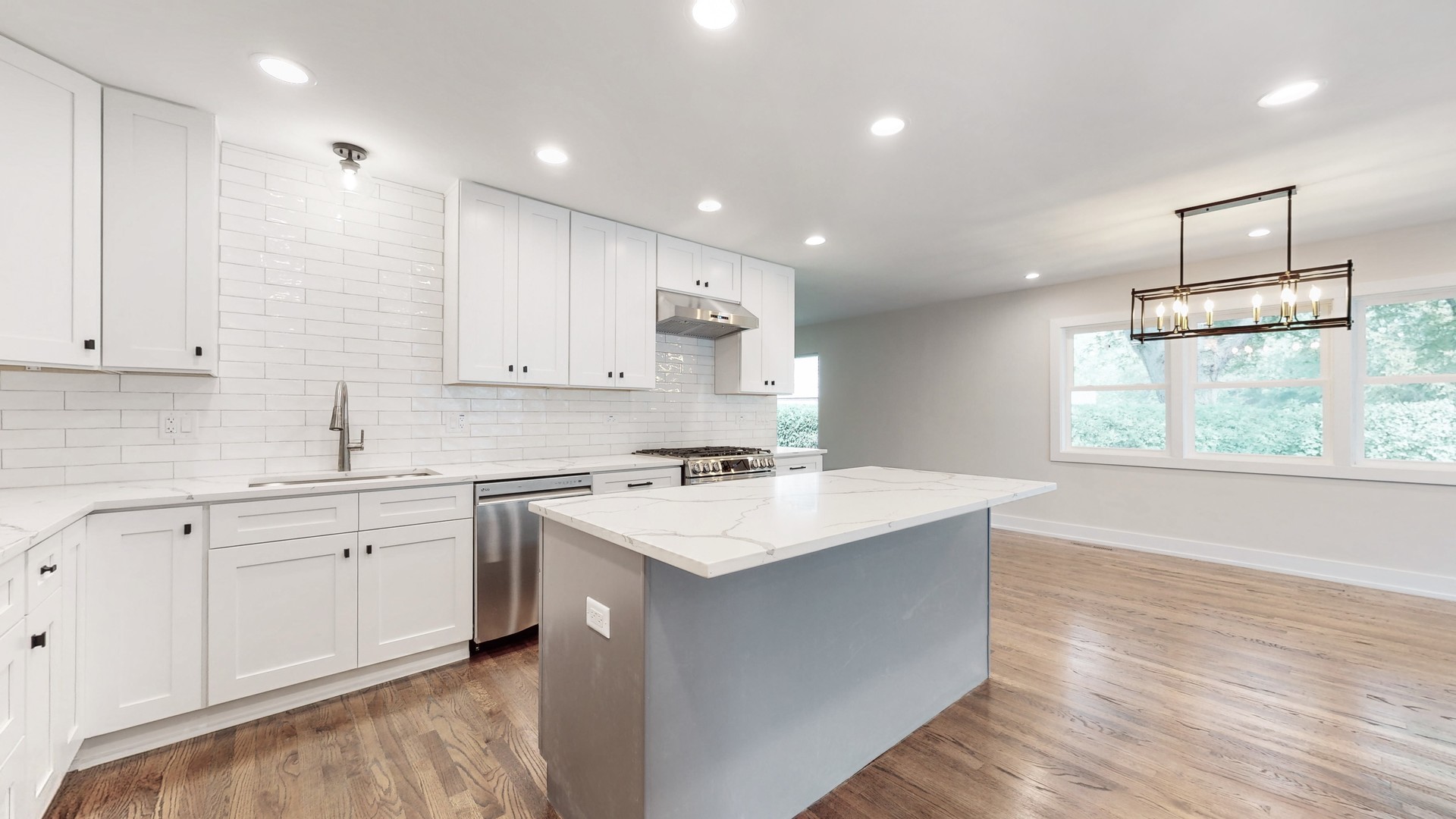 1617 Birch Road Northbrook, IL 60062 - Photo 15 of 32 a kitchen with a sink stove and cabinets