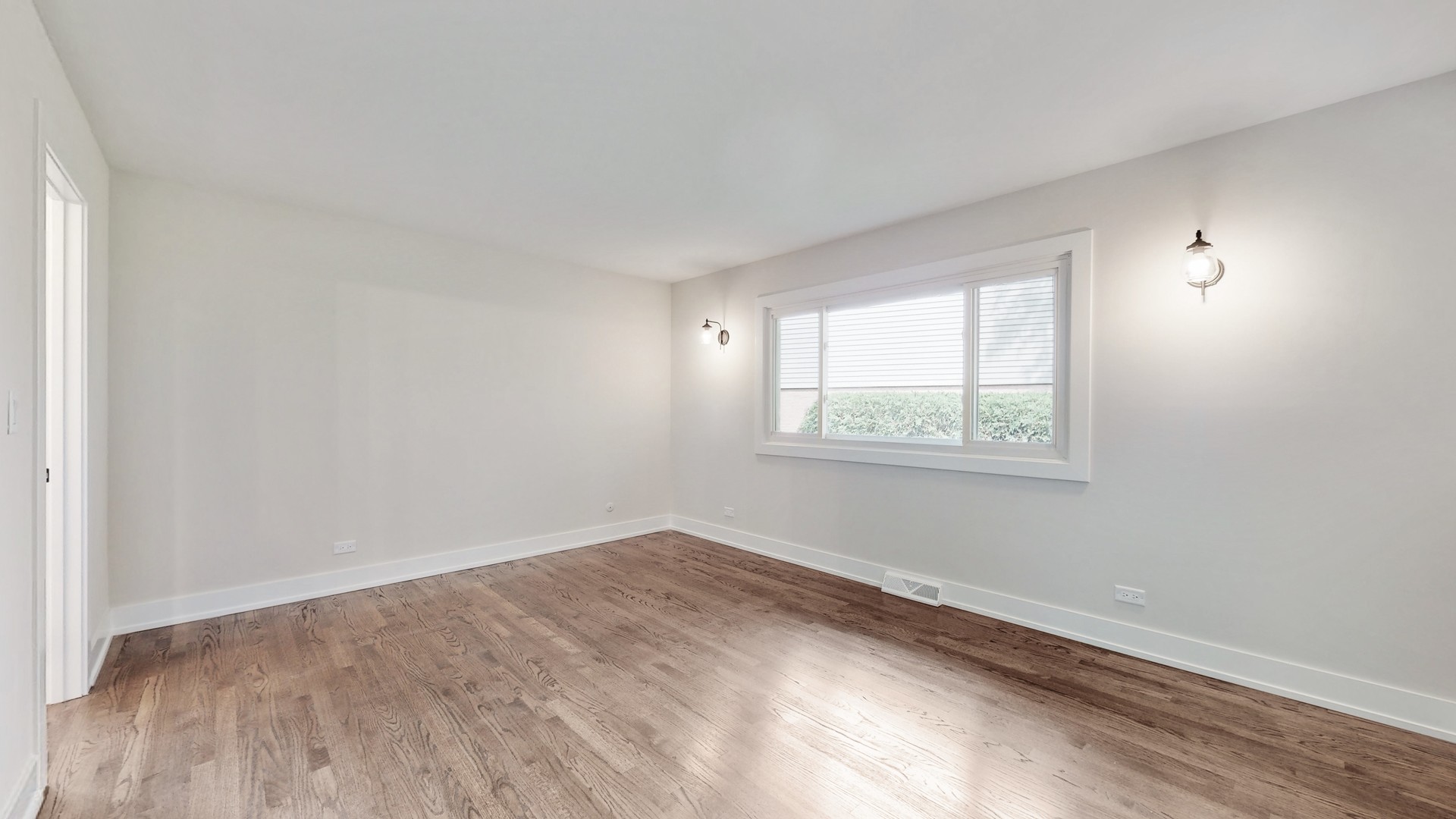 1617 Birch Road Northbrook, IL 60062 - Photo 17 of 32 an empty room with windows