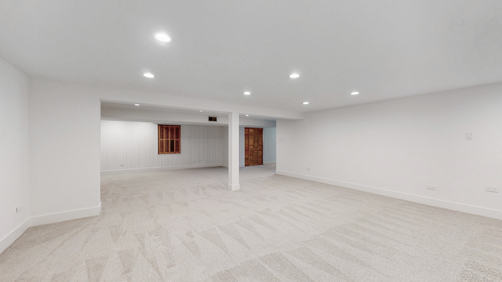 1617 Birch Road Northbrook, IL 60062 - Photo 25 of 32 an empty room with closet and windows