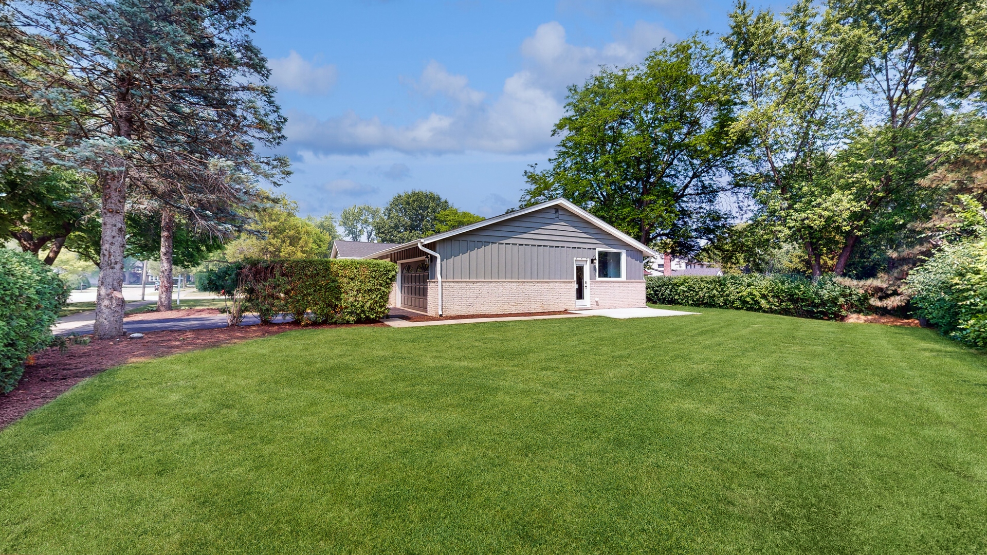 1617 Birch Road Northbrook, IL 60062 - Photo 29 of 32 a view of a house with backyard and garden