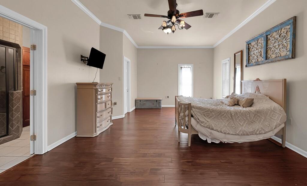 2300 North Rock Creek Road Waco, TX 76708 - Photo 16 of 40 a living room with furniture and a wooden floor