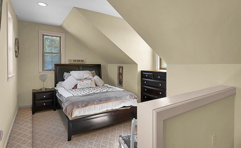 2300 North Rock Creek Road Waco, TX 76708 - Photo 26 of 40 a bedroom with a bed and a television