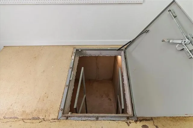 a living room with a couch and a table