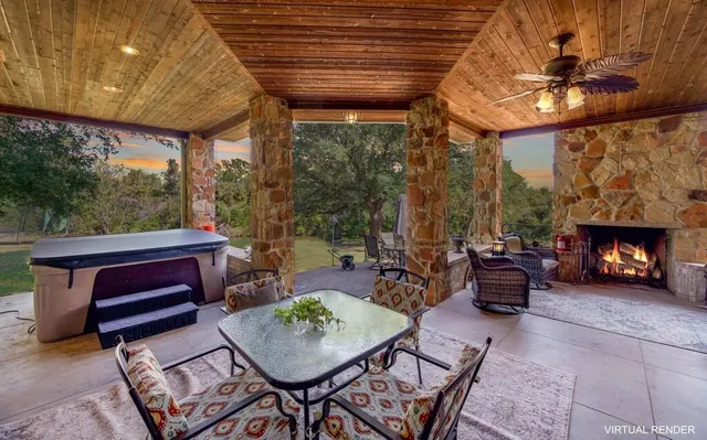 a kitchen with furniture a window and a fireplace