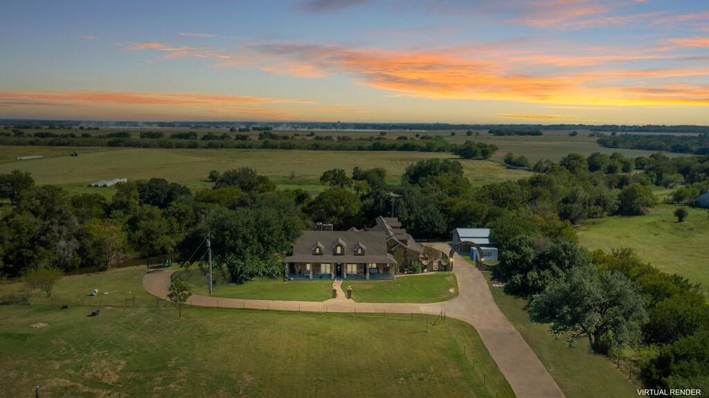 2300 North Rock Creek Road Waco, TX 76708 - Photo 3 of 40 a view of a lake with houses in the background