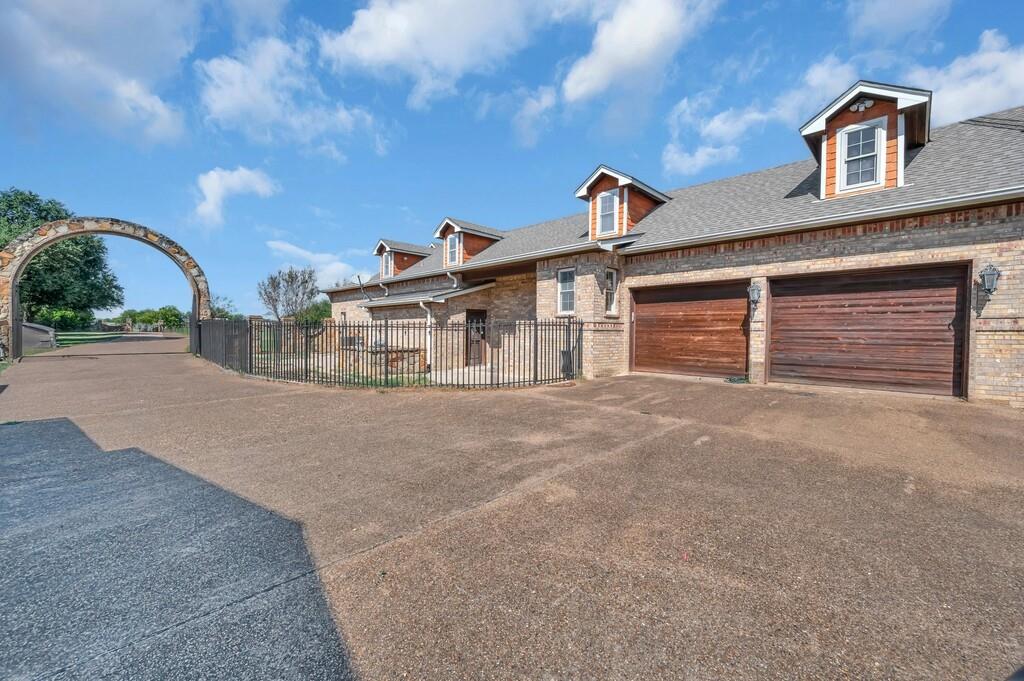 2300 North Rock Creek Road Waco, TX 76708 - Photo 33 of 40 a view of a house with a backyard