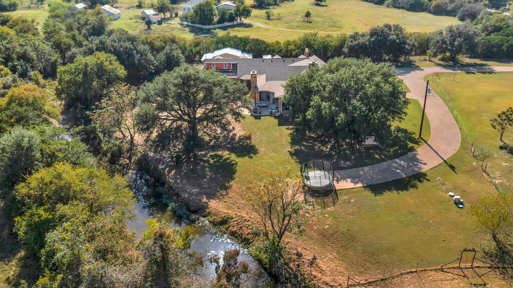 2300 North Rock Creek Road Waco, TX 76708 - Photo 37 of 40 an aerial view of residential houses with outdoor space