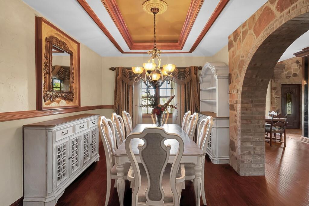 2300 North Rock Creek Road Waco, TX 76708 - Photo 8 of 40 a view of a dining room with furniture window and wooden floor