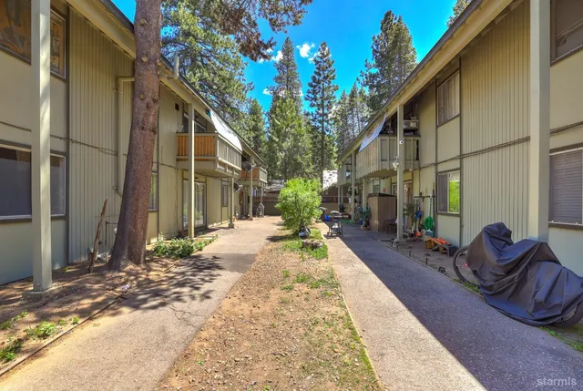 a view of a building with sitting area
