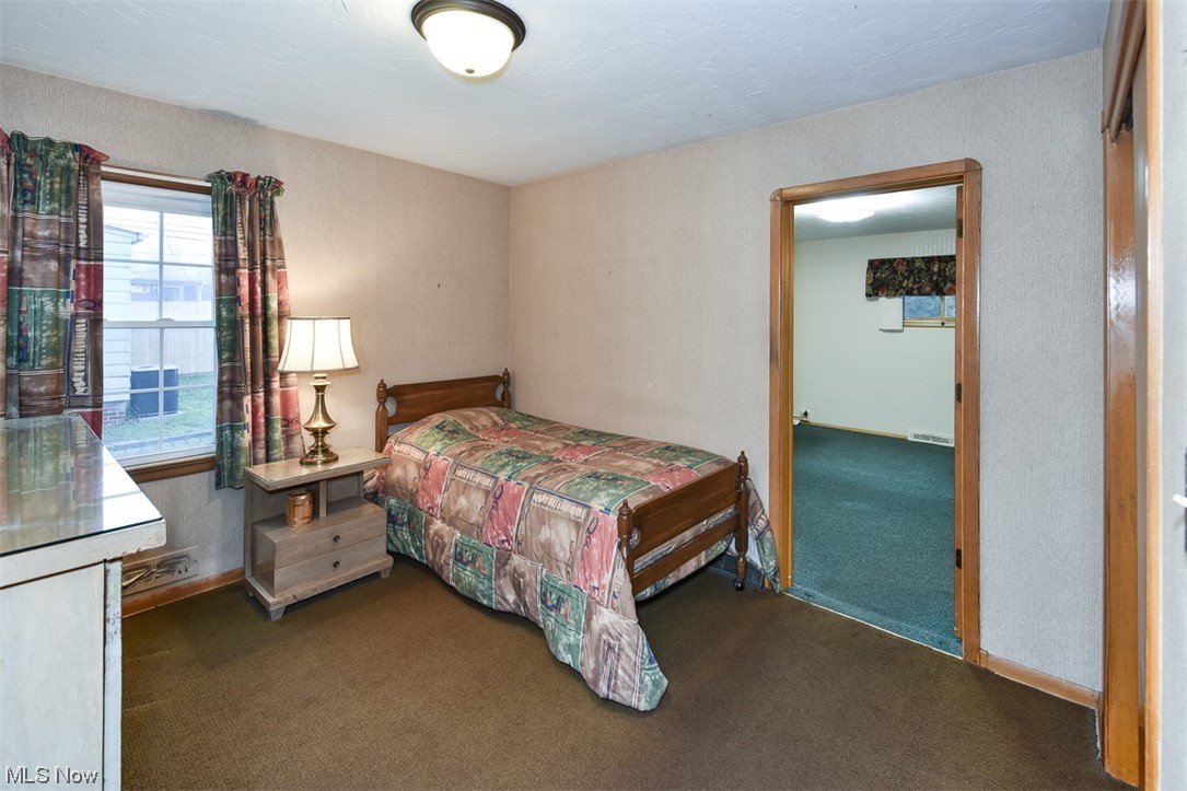 4026 Stonehaven Road Cleveland, OH 44121 - Photo 20 of 30 Bedroom with dark colored carpet