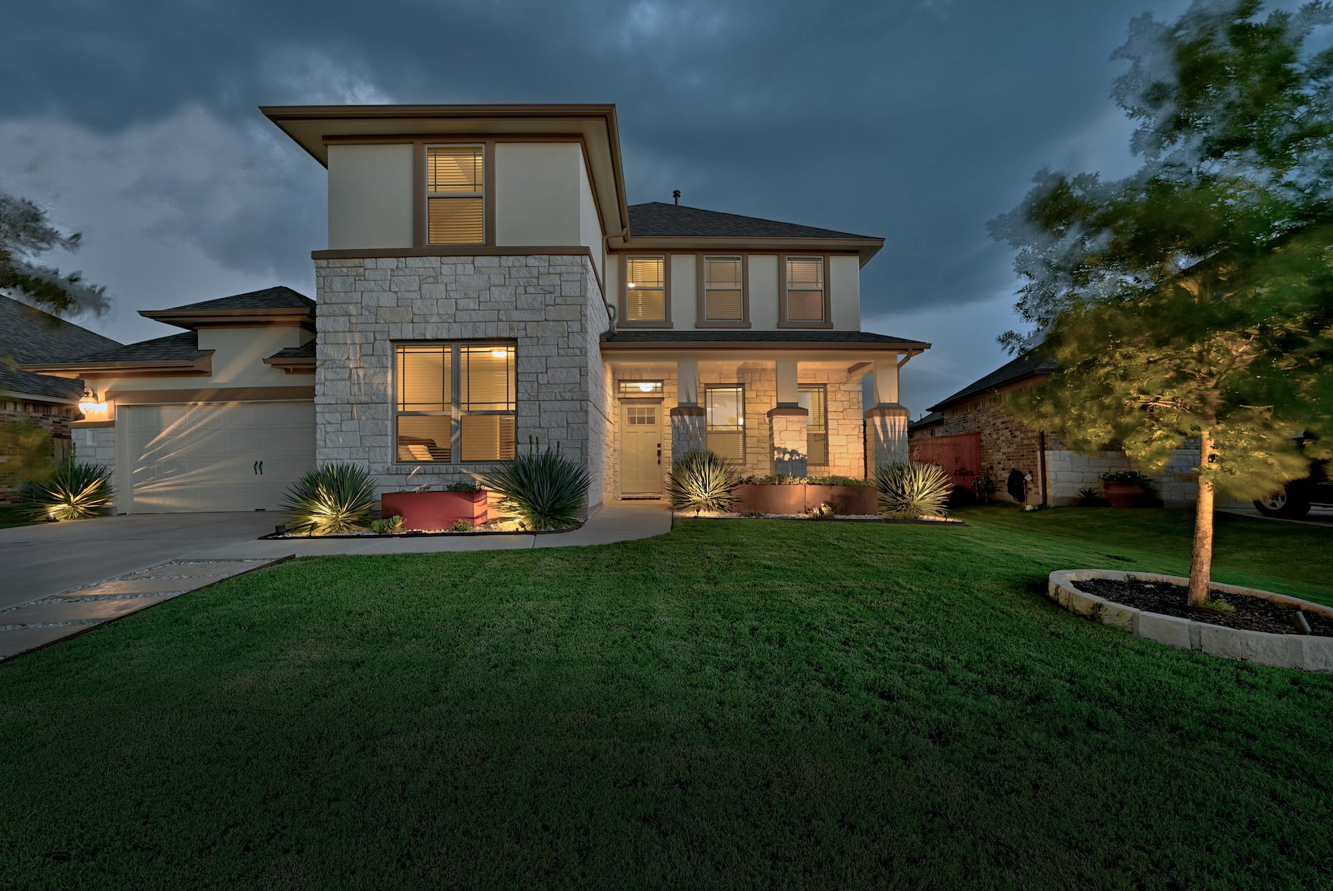 12613 Twisted Root Drive Manchaca, TX 78652 - Photo 1 of 33 Welcome to this truly beautiful home. (image from 2022, landscaping and lighting still the same)