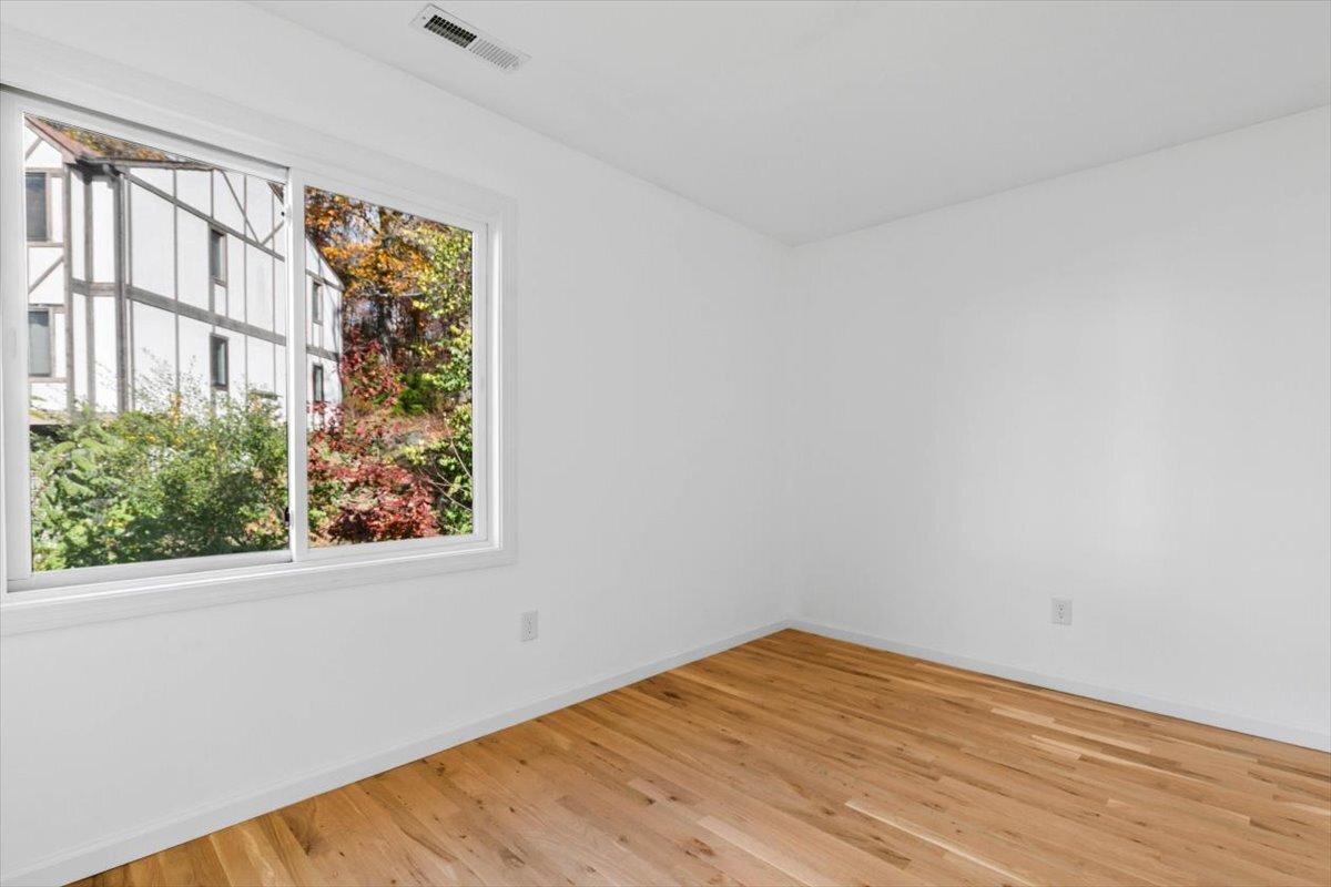 204 New Haven Avenue, Unit 2G Derby, CT 06418 - Photo 23 of 24 an empty room with a window