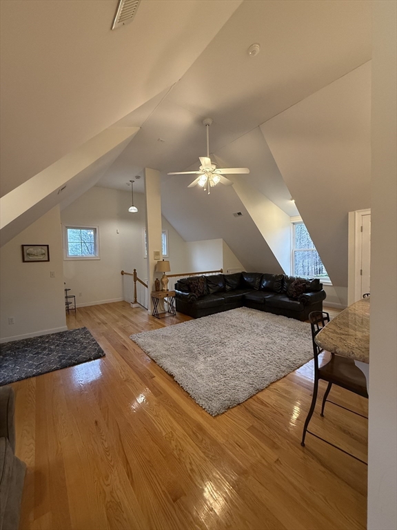 79 Freeman Road, Unit ADU Charlton, MA 01507 - Photo 3 of 18 a living room with couch and wooden floor