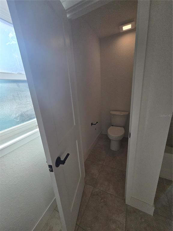 2533 Clearwood Street Inverness, FL 34452 - Photo 20 of 21 a view of a bathroom from a corridor
