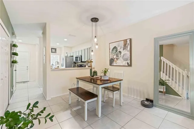 a view of kitchen with furniture and wooden floor