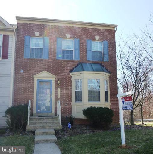 9229 Howland Road Laurel, MD 20723 - Photo 1 of 15 a front view of a house with a yard