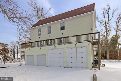 a front view of a house with a garage