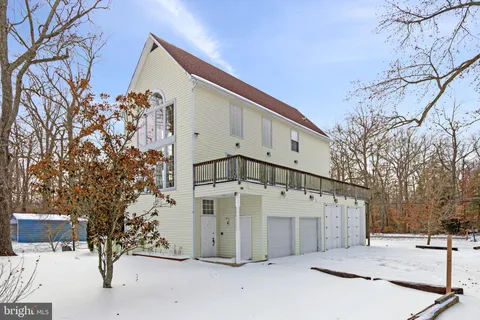 a front view of a house with a garage