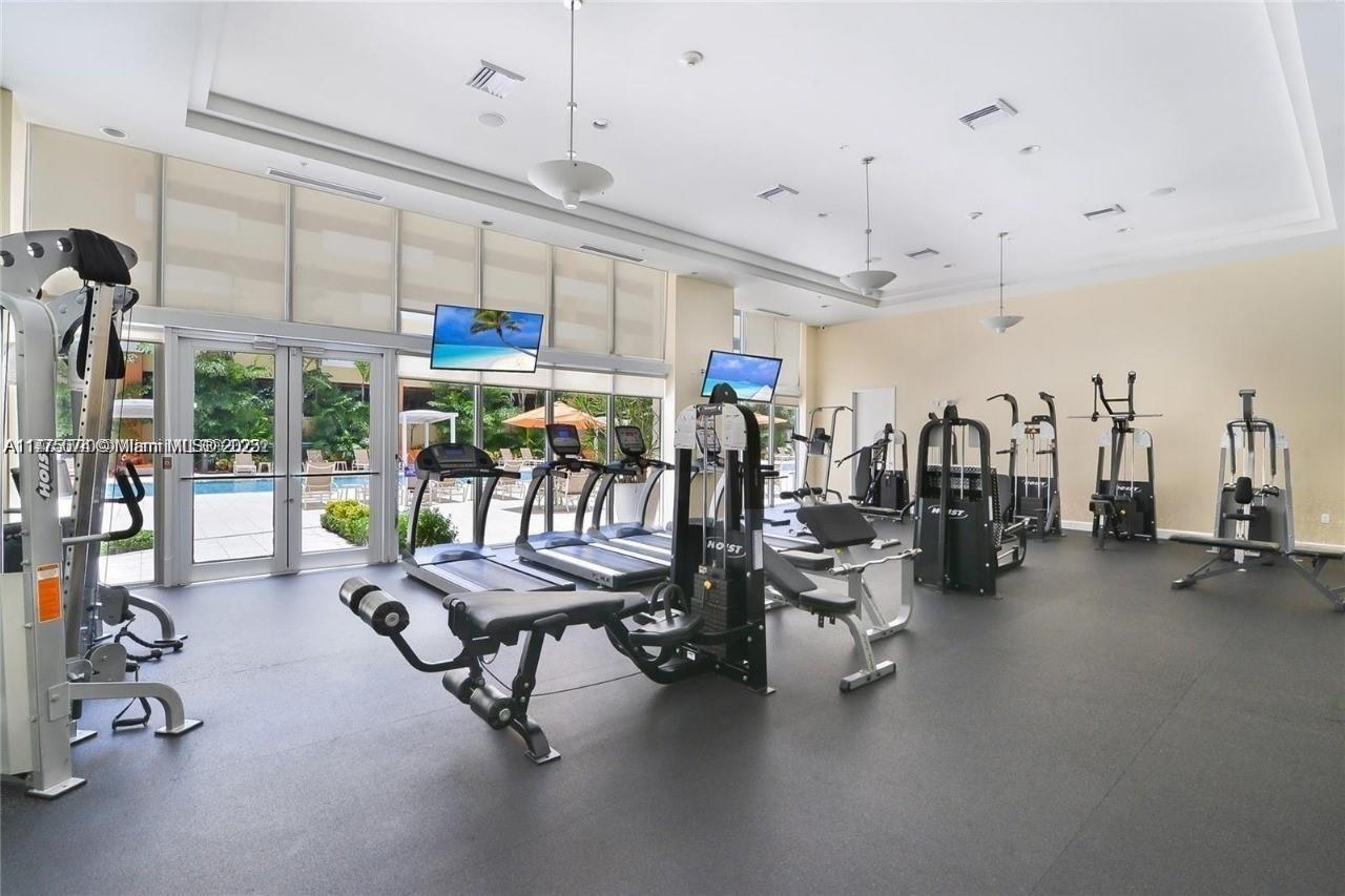 2775 Northeast 187th Street, Unit 326 Aventura, FL 33180 - Photo 19 of 23 a view of a room with gym equipment