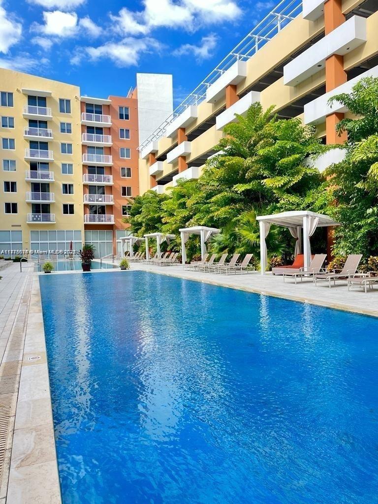 2775 Northeast 187th Street, Unit 326 Aventura, FL 33180 - Photo 5 of 23 a view of building with outdoor space