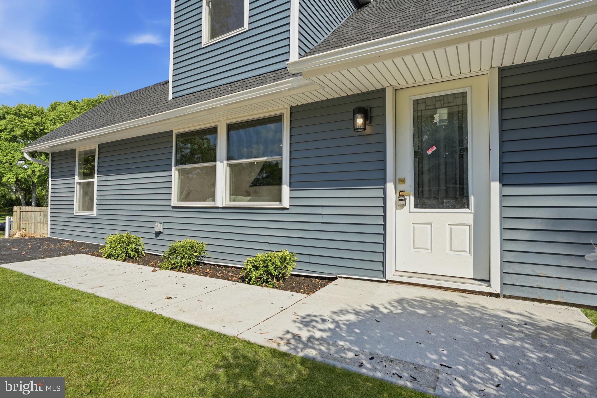 22 Peppermint Road Levittown, PA 19056 - Photo 33 of 42 Grass is virtual due to new seeding at the home