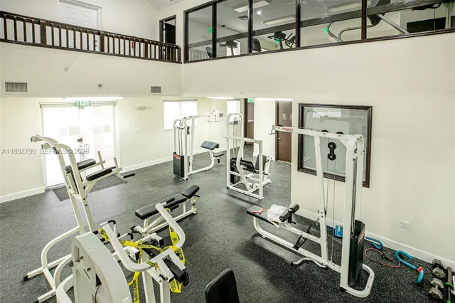 a view of a room with gym equipment